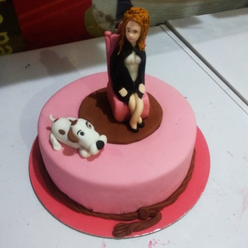 Girl with Dog Fondant Cake Delivery in Greater Noida