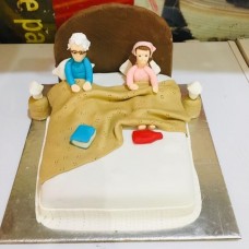 Old Parents in Bed Theme Cake